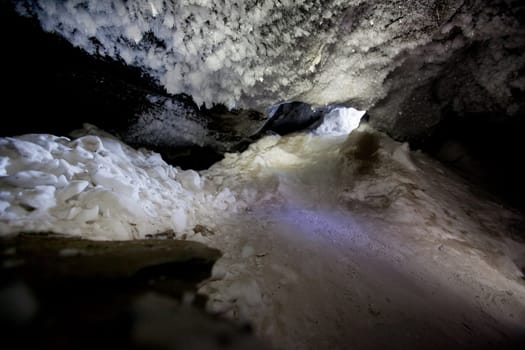 A dark and mysterious snow ice cave - A glacial grotto