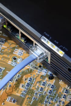 Close-up of ethernet connector on background witn circuit board