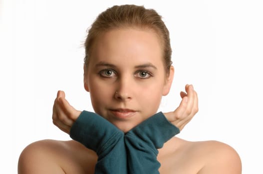beautiful young woman with hand up framing face on white background
