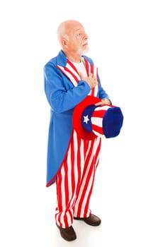Uncle Sam standing at attention to recite the pledge of allegiance.  Full body isolated.