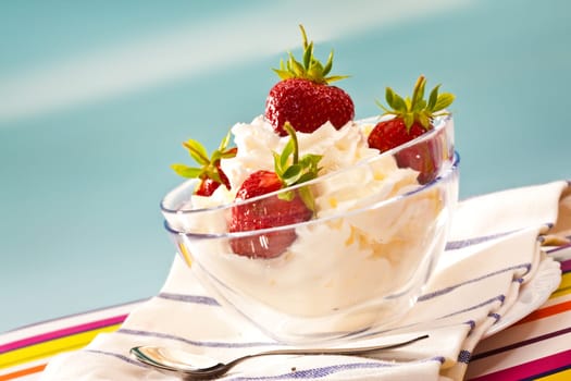 food series: strawberry with whipped cream in glassy bowl