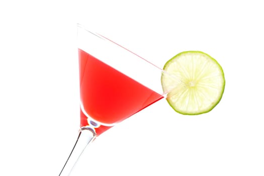 A glass of fresh strawberry cocktail with lime slice isolated on white background