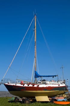 Sailing boat being repaired on the Holy Island of Lindisfarne