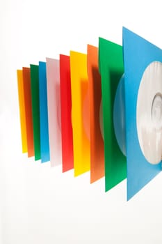 Multiple disc sleeves, standing on a clean background with a disc showing in the first window.