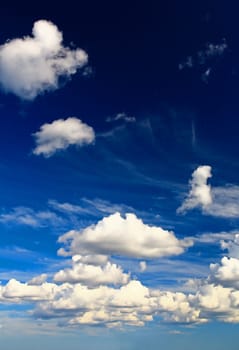 White clouds over blue sky - a great background image for many uses