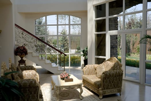 Luxury modern living room with big windows