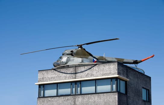 Helicopter on the rooftop of an office building in Maasdijk, the Netherlands