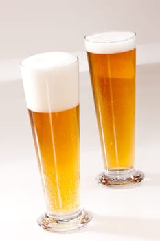 drink series: two glassy bocal with light beer