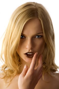 Close-up portrait of a fresh and beautiful young fashion model with brown lips