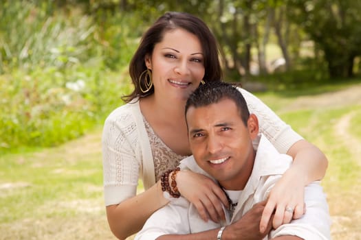 Affectionate Happy Hispanic Couple in the Park.