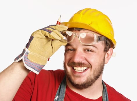 fine portrait of young caucasian handyman isolated on white