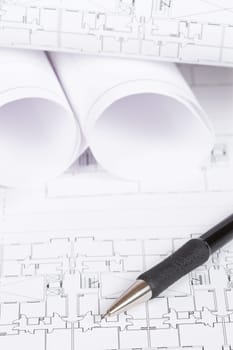 Construction plans and automatic pencil. Shallow depth of field