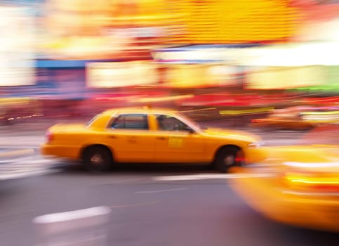 Taxi at times square at night in New York City