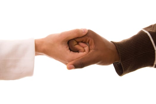 Black and white hands shaking in friendly agreement isolated on white