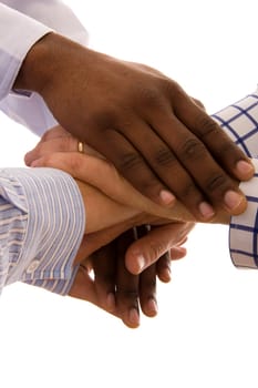 Many multiracial hands together isolated on white