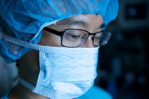 An Asian Doctor Working in a Hospital