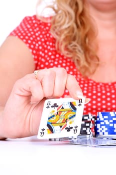 Sexy young woman playing poker