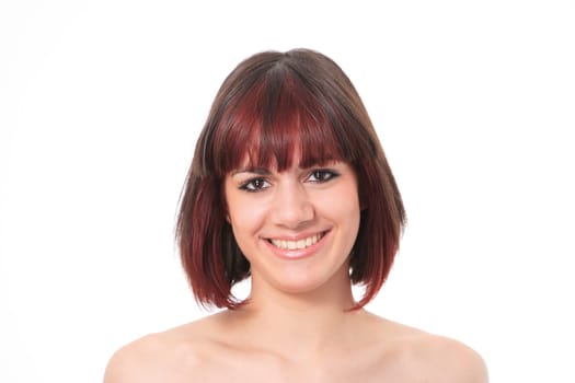 Closeup portrait of a happy young woman smiling isolated on white background