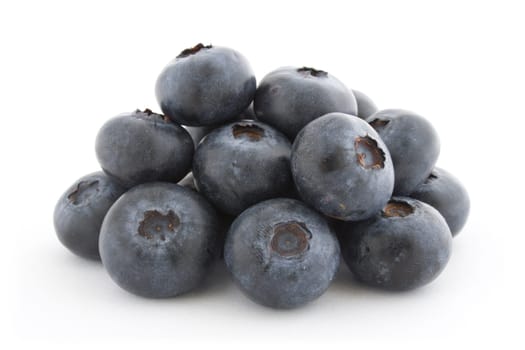 A pile of fresh blueberries isolated on white background with shadow.
