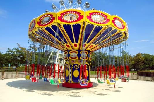 Colorful carousel in atraction park