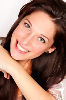 Portrait of a smiling young woman with black hair