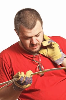 fine close up portrait of caucasian manual worker with tool