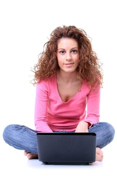 Closeup portrait of a young woman using laptop