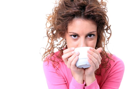 Young woman with a cup of hot drink