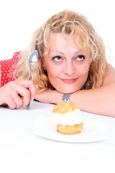 Hungry gluttonous woman eating cake