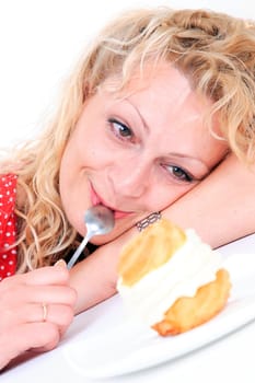 Hungry gluttonous woman eating cake