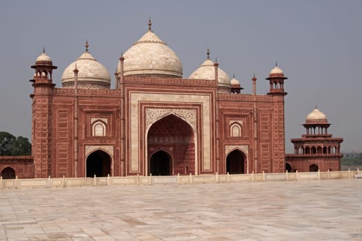 Mosque at the Taj Mahal. Mughal style building of red sandstone inlaid with marble. Agra, Uttar Pradesh, India