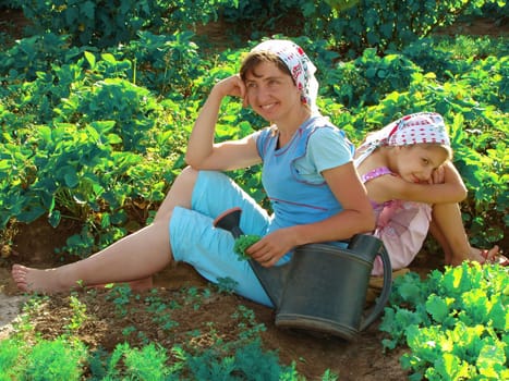 mother and daughter resting together
