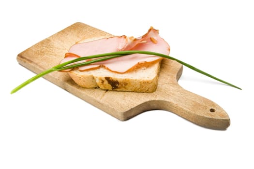 delicious sandwich with ham and green onion