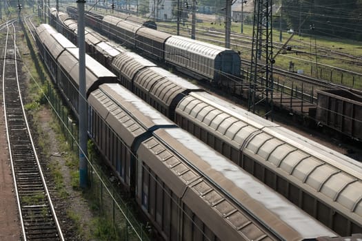 Freight trains waiting at a station