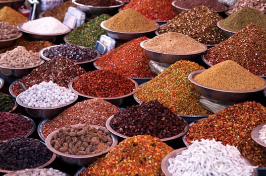 Bowls of pulses and spices on a market stall in Ahmadabad, Gujarat, India