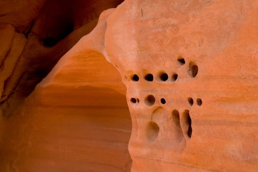 Holes in a sandstones bite by the wind in Valley Of Fire State Park