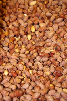 Salty peanuts  background - vertical