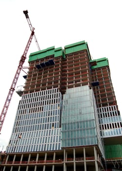Construction of new skyscraper from concrette and steel