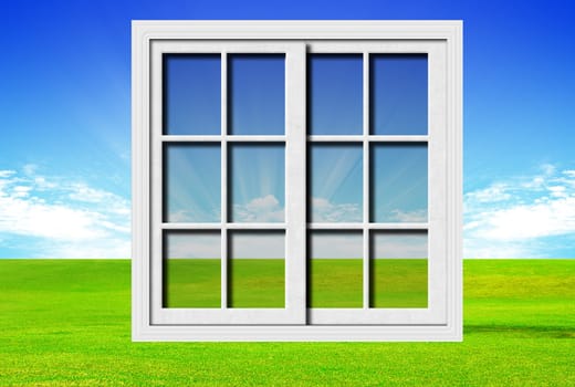 Modern window on grass and clouds backgrounds