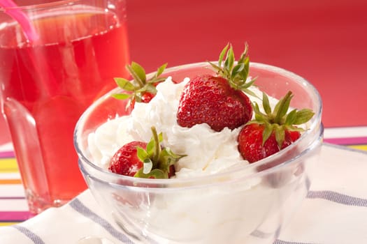 food series: strawberry with whipped cream in glassy bowl