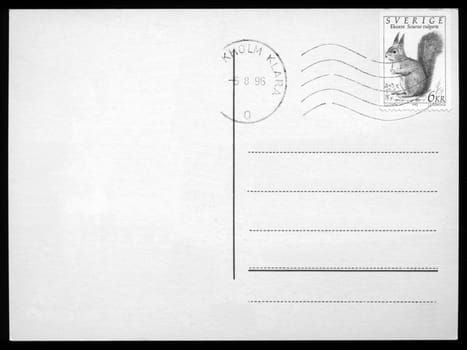 Blank postcard with stamp and postage meter