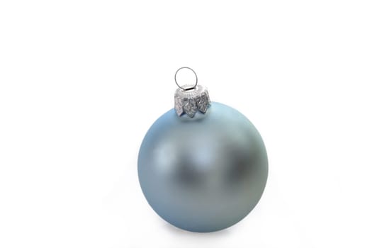 Christmas ball on bright background. Shot in studio.