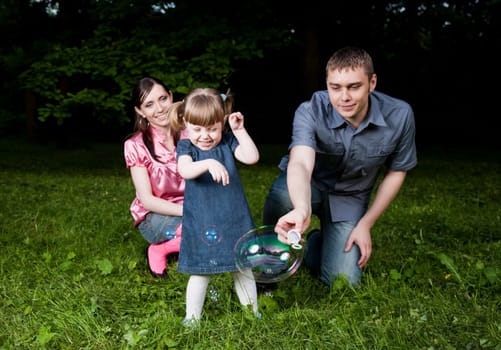 Father Playing With Soap Bubbles