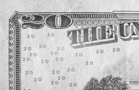 A close up on a twenty dollar bill. Shallow depth of field.