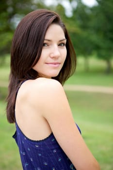 A Fresh Faced Girl With a beautiful face and green background