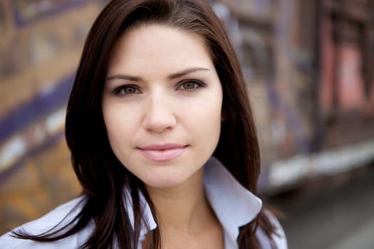 A Beautiful Brunette in a collared shirt with an edge