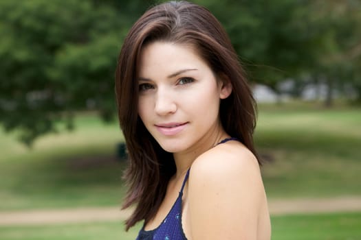 A Fresh Faced Girl With a beautiful face and green background
