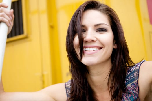 An Edgy Brunette with a yellow backround