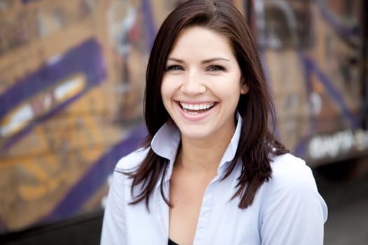A Beautiful Brunette in a collared shirt with an edge