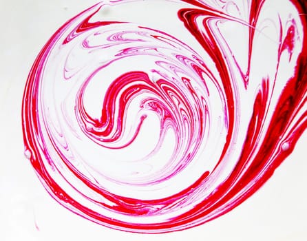 Red paint splashed over white background